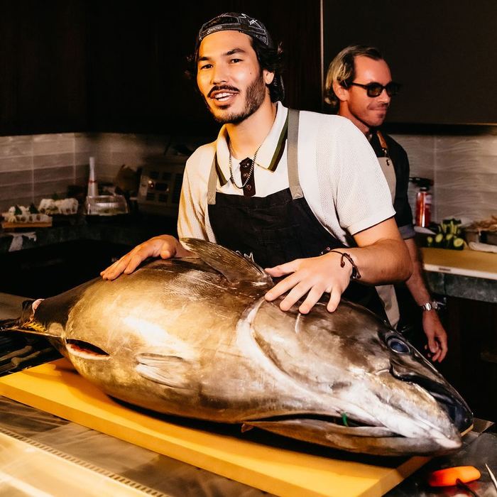 An itamae behind a whole bluefin.